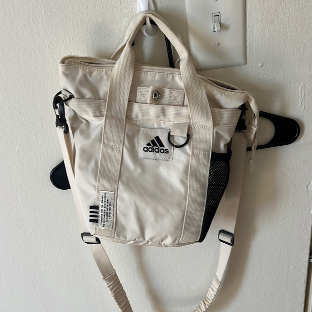 Adidas Cream Backpack with Adjustable Straps and Minimalist Design